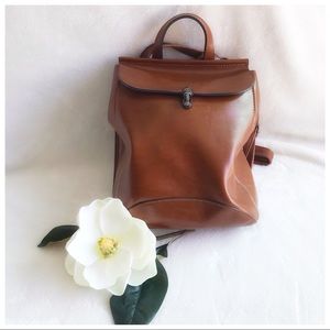 Convertible leather backpack. Versatile!